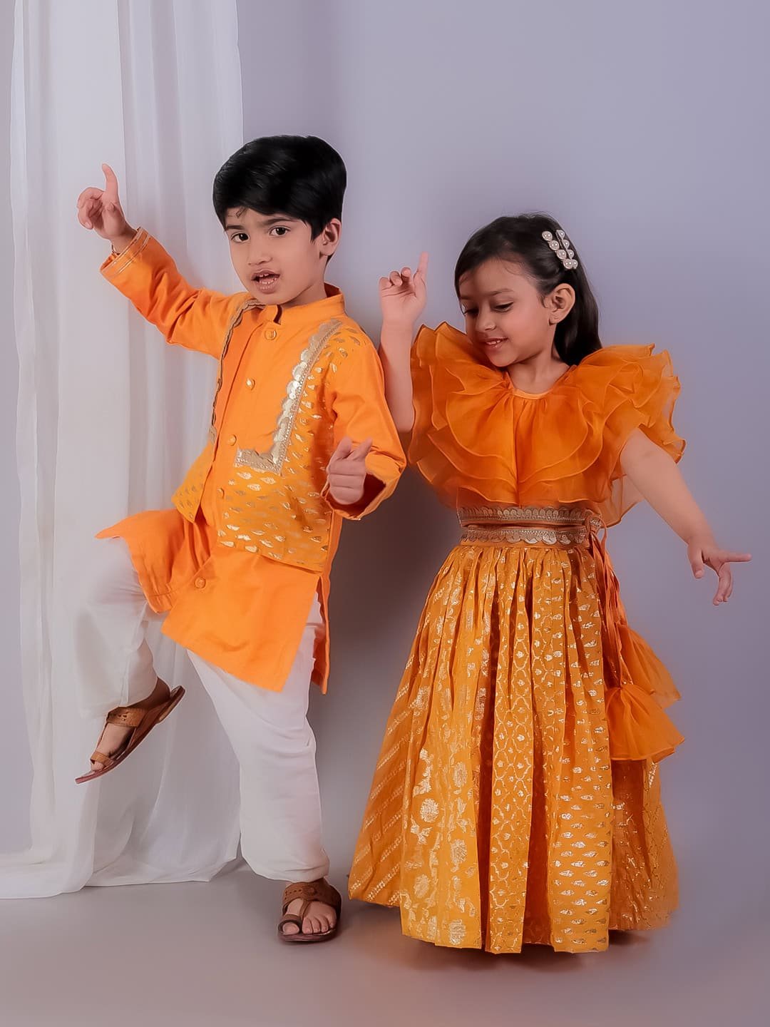 ORANGE ORGANZA FRILL CHANDERI LEHNGA SET