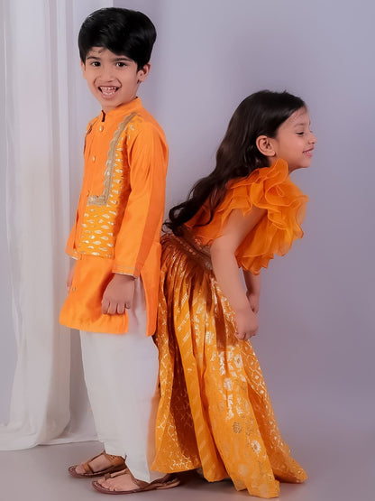 ORANGE ORGANZA FRILL CHANDERI LEHNGA SET