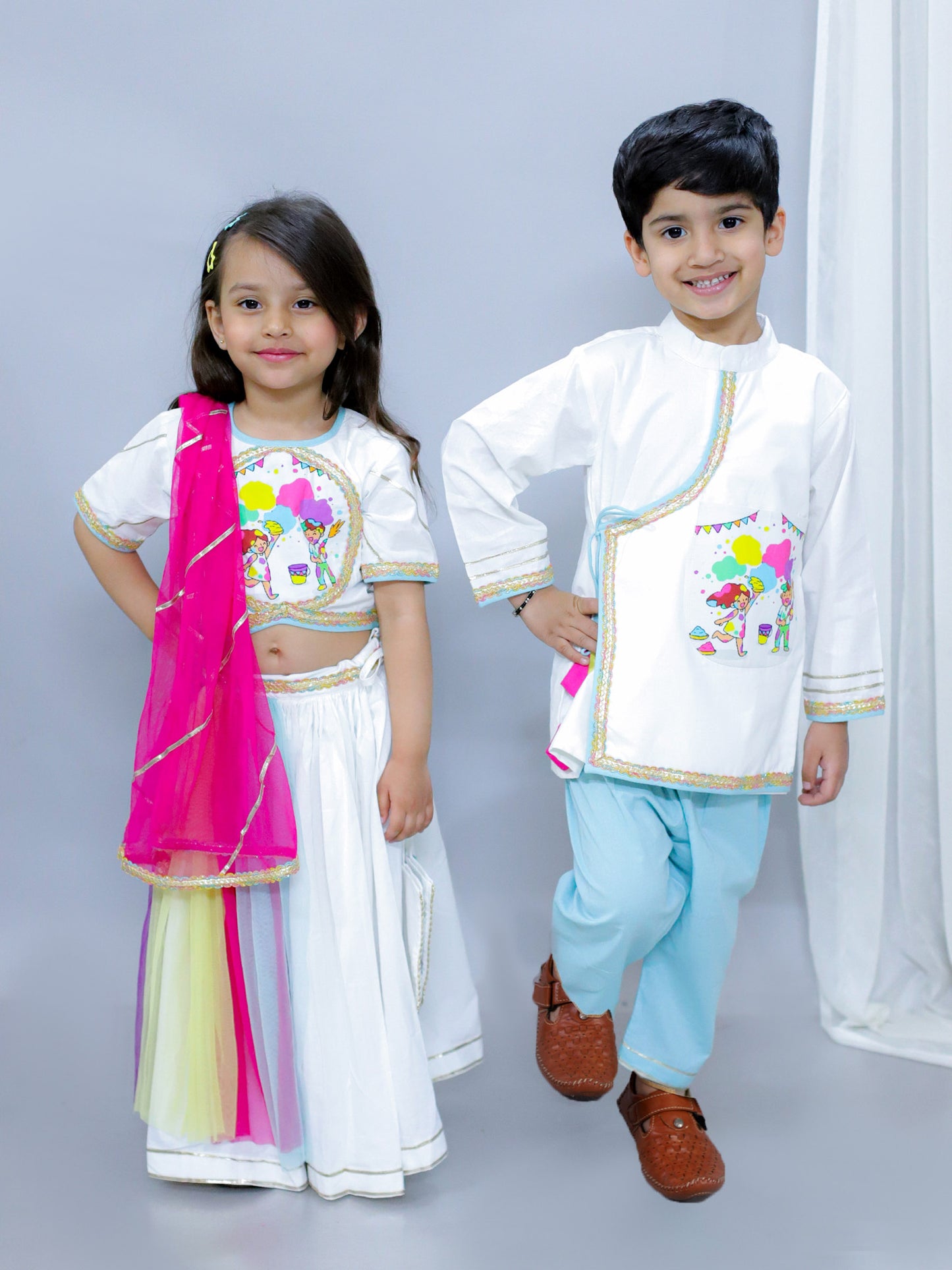 KIDS PLAYING HOLI PRINTED POCKET KURTA PYJAMA SET
