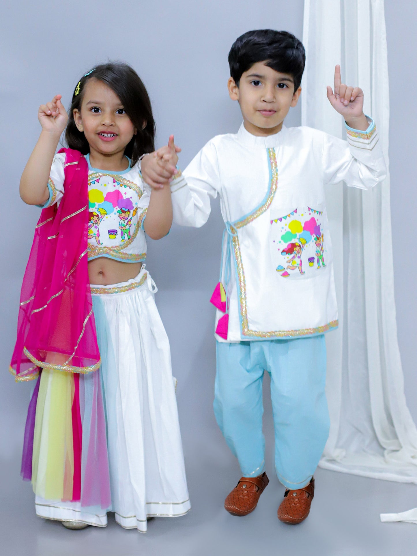 KIDS PLAYING HOLI PRINTED POCKET KURTA PYJAMA SET