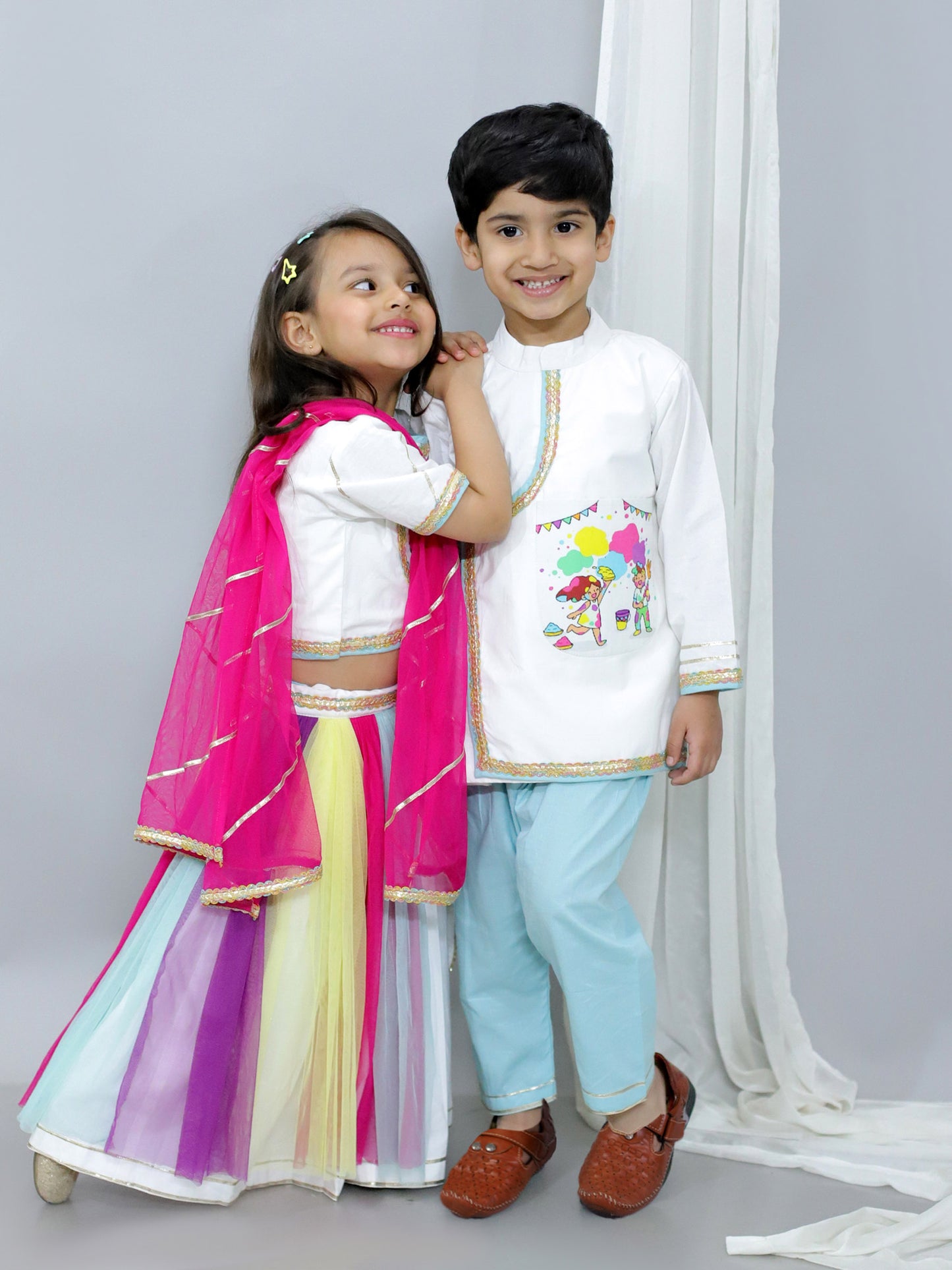 KIDS PLAYING HOLI PRINTED POCKET KURTA PYJAMA SET