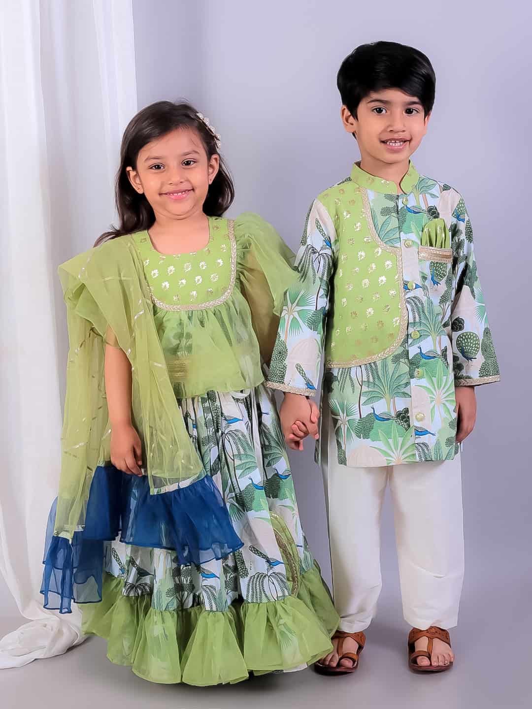 GREEN JUNGLE PRINTED KURTA PYJAMA WITH CHANDERI PANELS