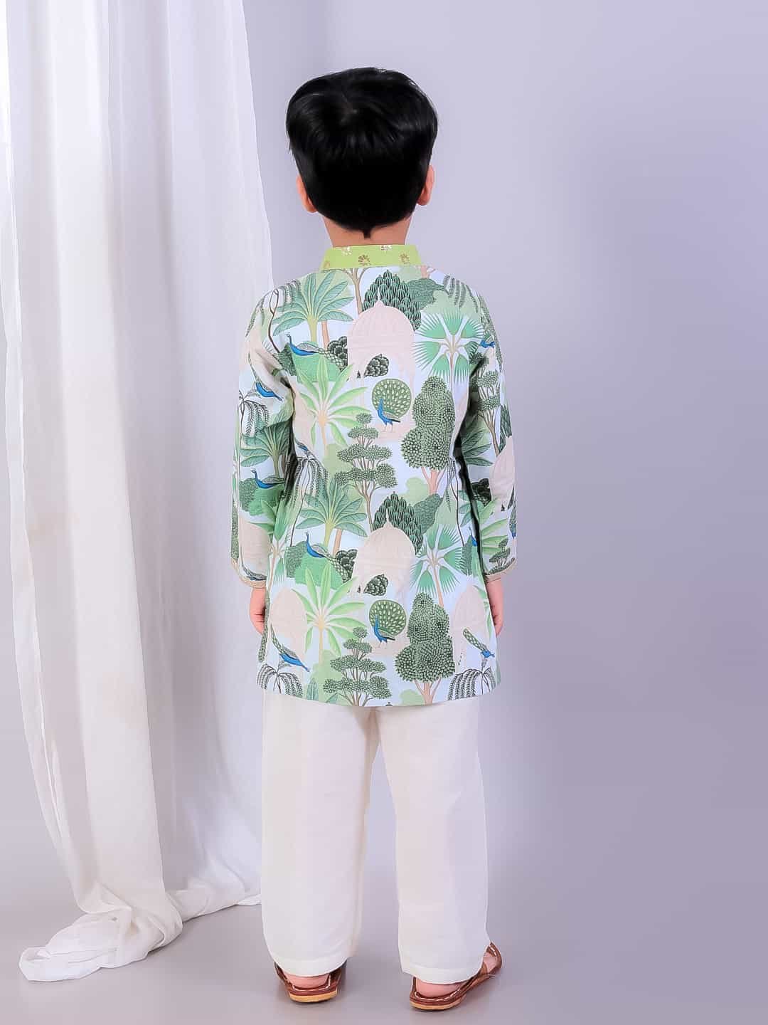 GREEN JUNGLE PRINTED KURTA PYJAMA WITH CHANDERI PANELS