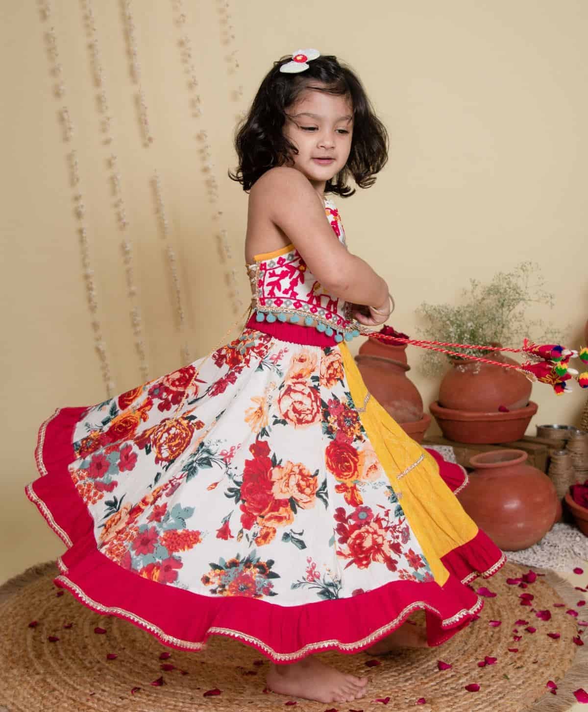 SLEEVELSS PLEATED LEHENGA CHOLI FLORAL BANDHANI