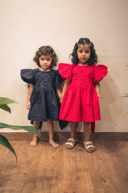 BLACK FROCK WITH BOW