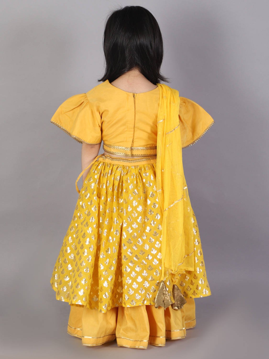 MUSTARD BLOUSE WITH ATTACHED NET DUPATTA AND DOUBLE LAYERED LEHENGA