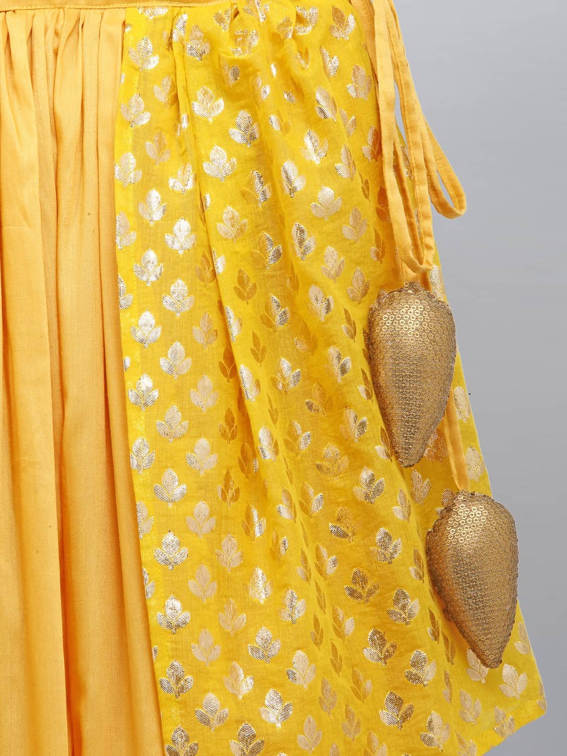 MUSTARD BLOUSE WITH ATTACHED NET DUPATTA AND DOUBLE LAYERED LEHENGA