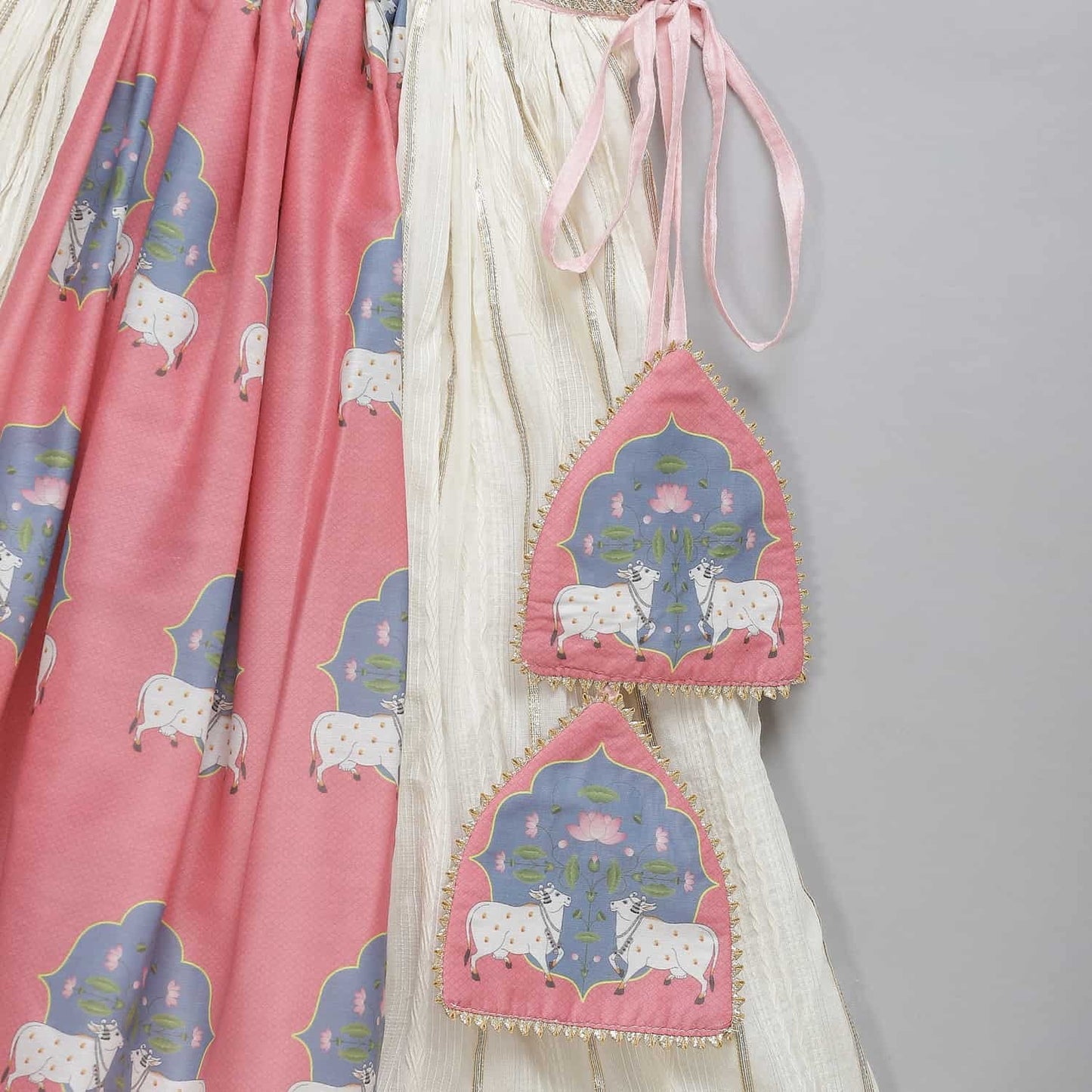 COW PRINTED PINK AND OFF WHITE LEHENGA SET