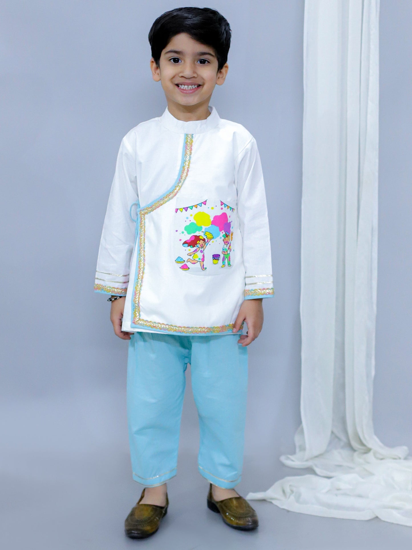 KIDS PLAYING HOLI PRINTED POCKET KURTA PYJAMA SET
