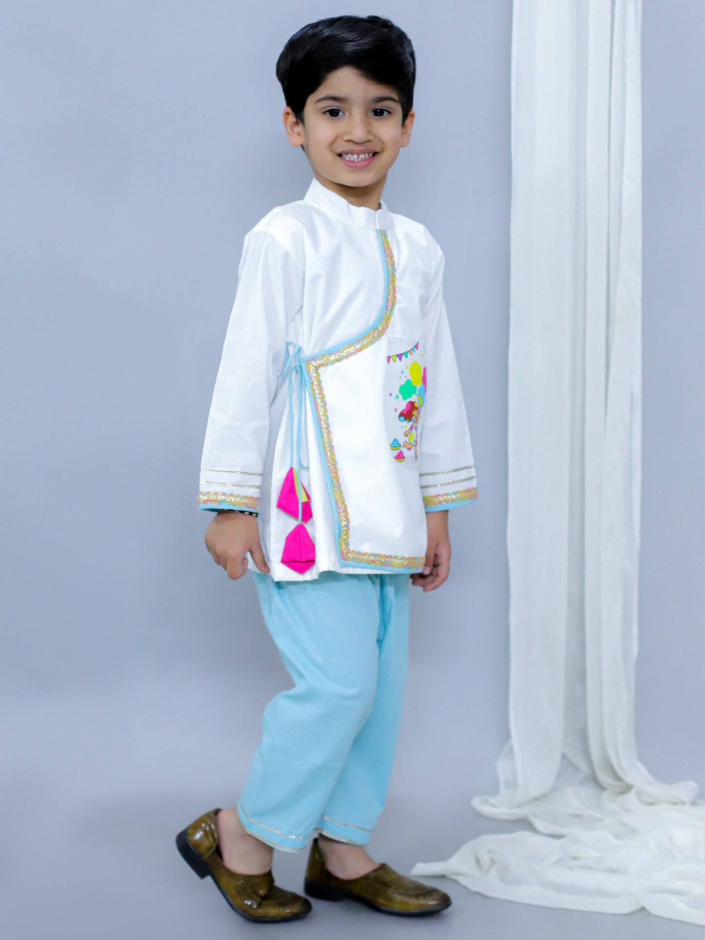 KIDS PLAYING HOLI PRINTED POCKET KURTA PYJAMA SET