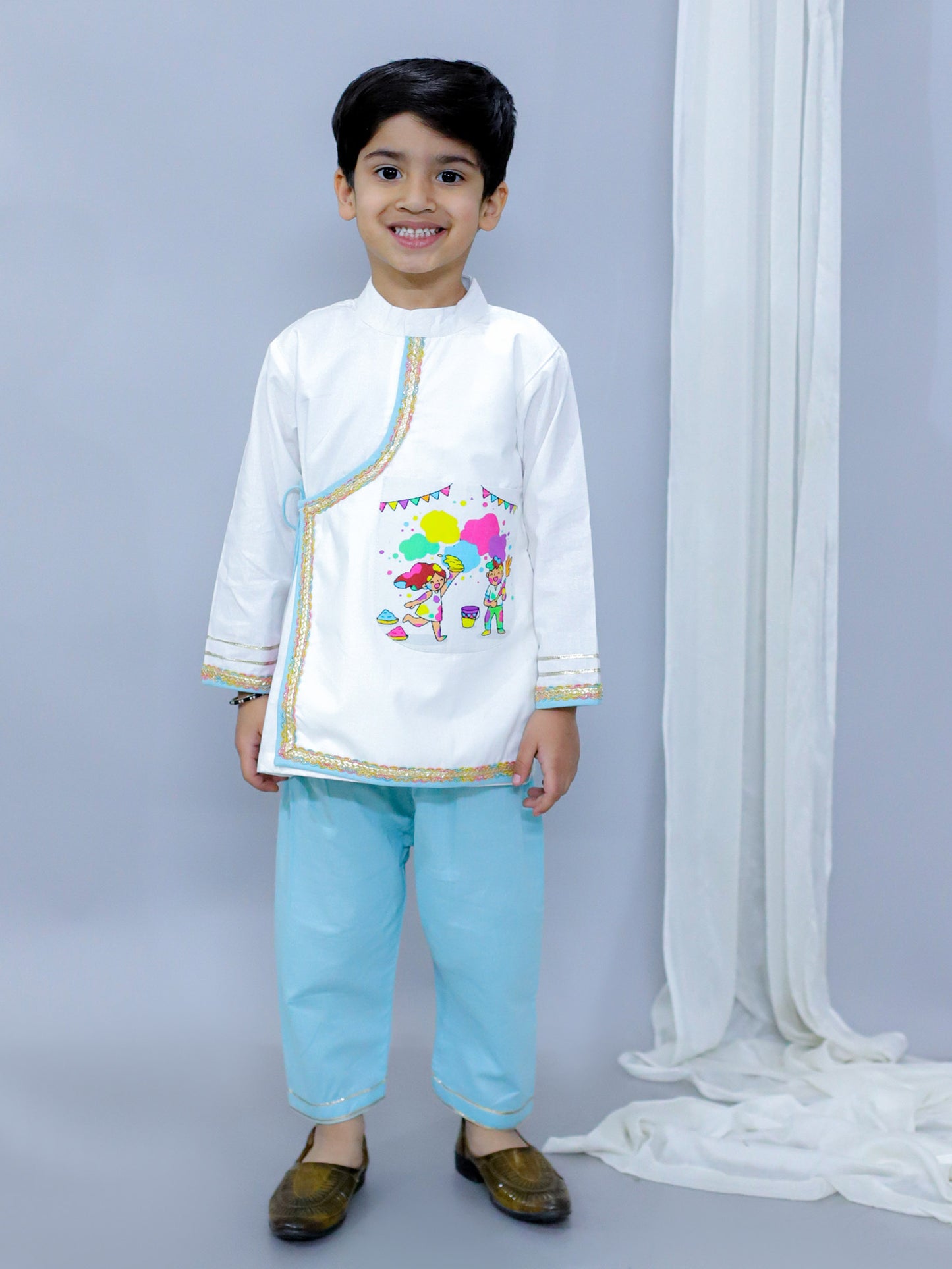 KIDS PLAYING HOLI PRINTED POCKET KURTA PYJAMA SET