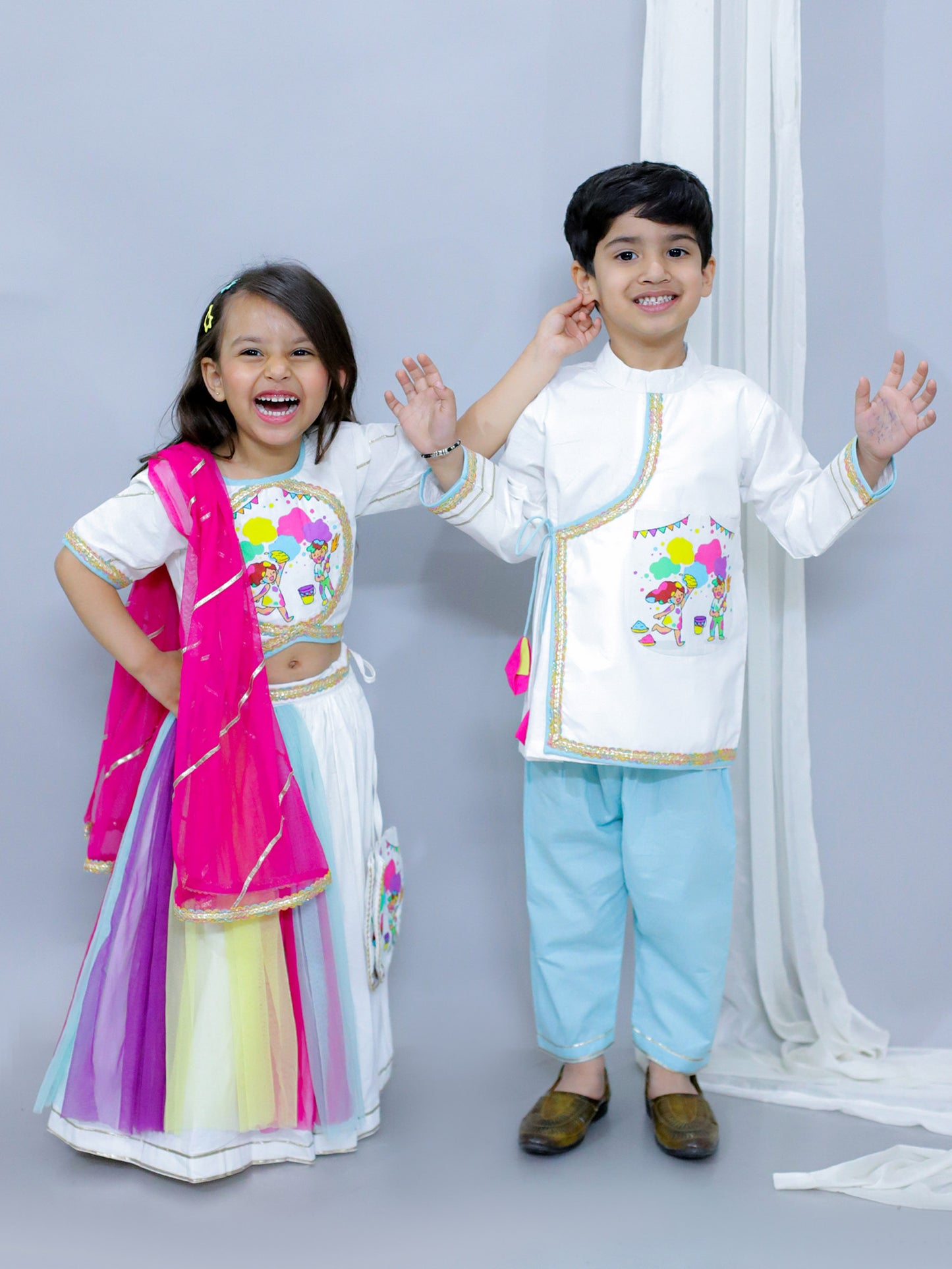 KIDS PLAYING HOLI PRINTED POCKET KURTA PYJAMA SET