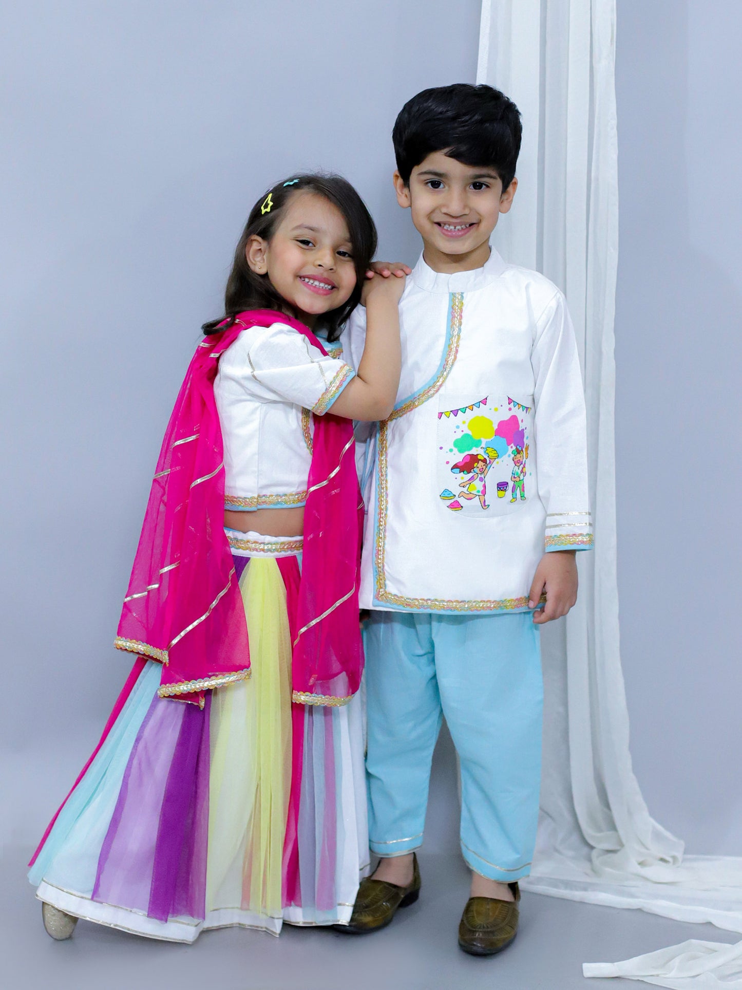KIDS PLAYING HOLI PRINTED POCKET KURTA PYJAMA SET