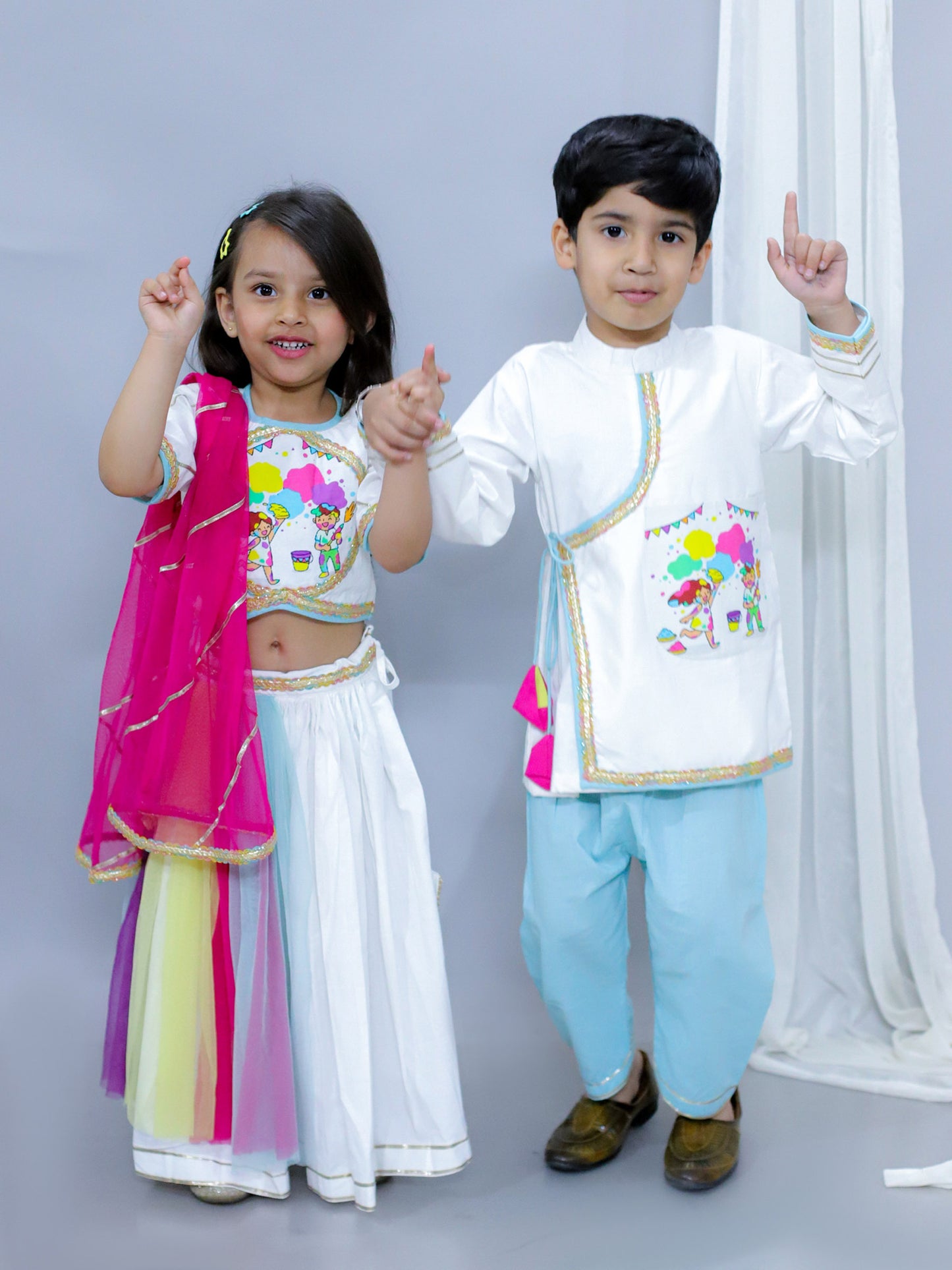 KIDS PLAYING HOLI PRINT WHITE HOLI LEHNGA SET